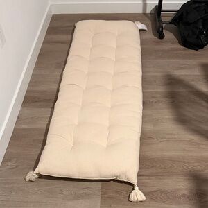 Elegant rectangular tasseled cushion